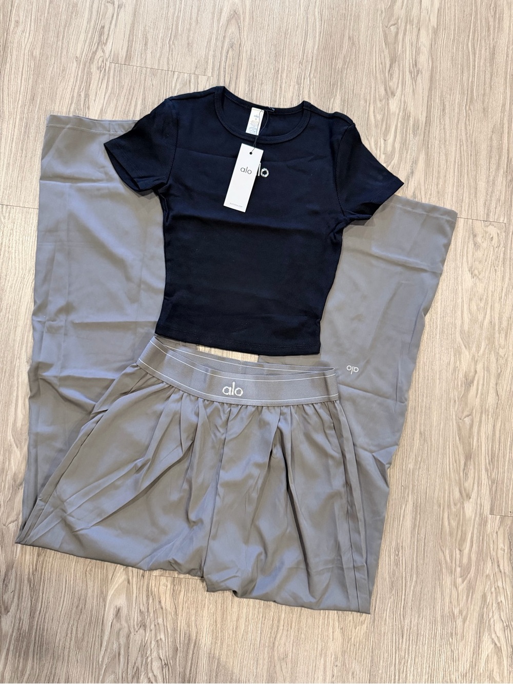 Alo Women Black Crop Tee and Gray Skirt Set